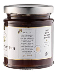 Close-up of jam spread on toast highlighting fruit chunks.