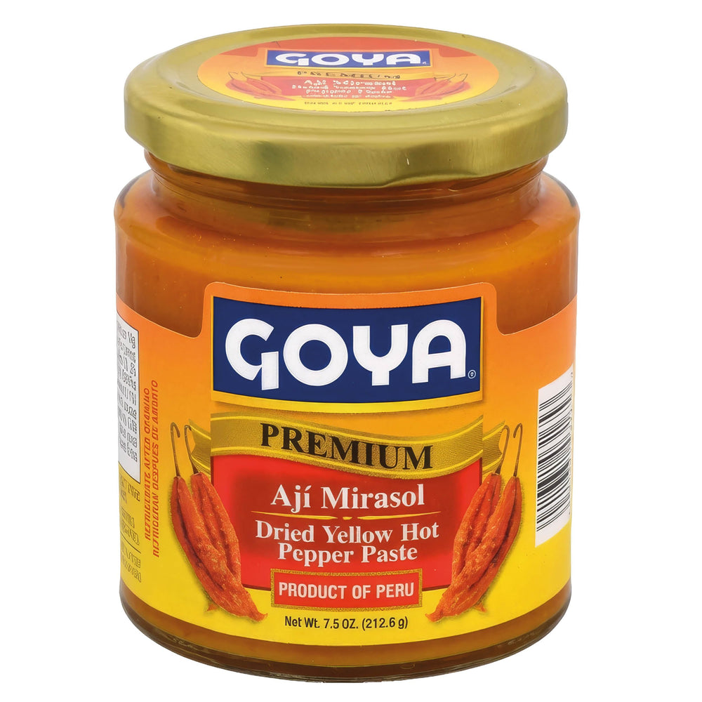 Goya Ají Mirasol paste jar closeup shows rich golden paste for vibrant Latin dishes.