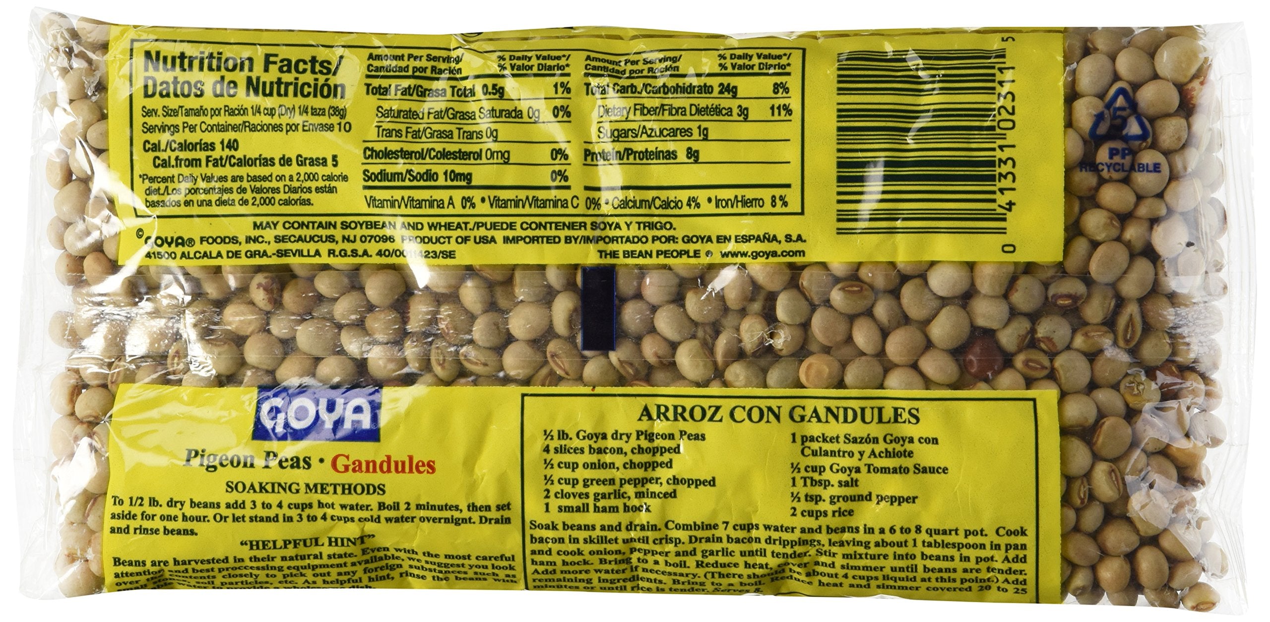 Goya Gandules cooking in a steaming pot, cozy kitchen aroma.