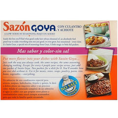 Goya Sazón sprinkled on poultry for quick, flavorful seasoning.