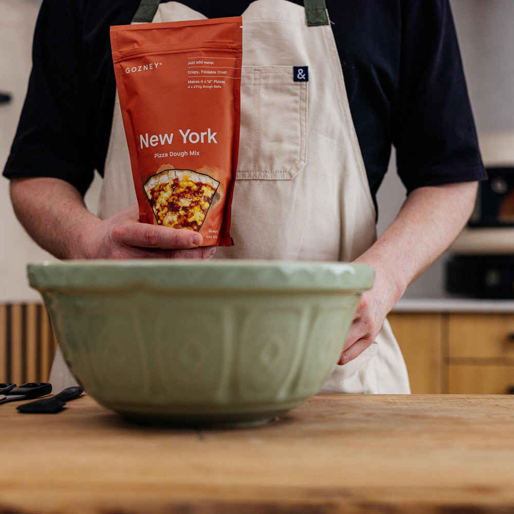 Gozney Just-Add-Water New York Dough Mix 12-inch pizza ready to bake.