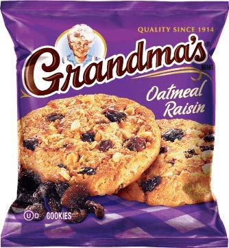 Close-up of Grandma's Oatmeal Raisin Cookies showing soft, chewy texture, great with milk.