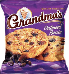 Close-up of Grandma's Oatmeal Raisin Cookies showing soft, chewy texture, great with milk.