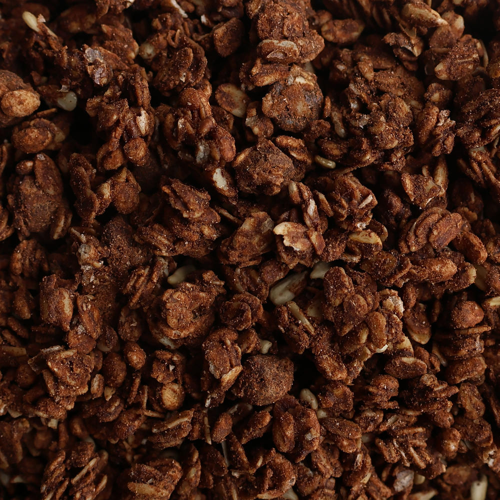 Kosher badge signals trusted plant-based, dairy-free granola.