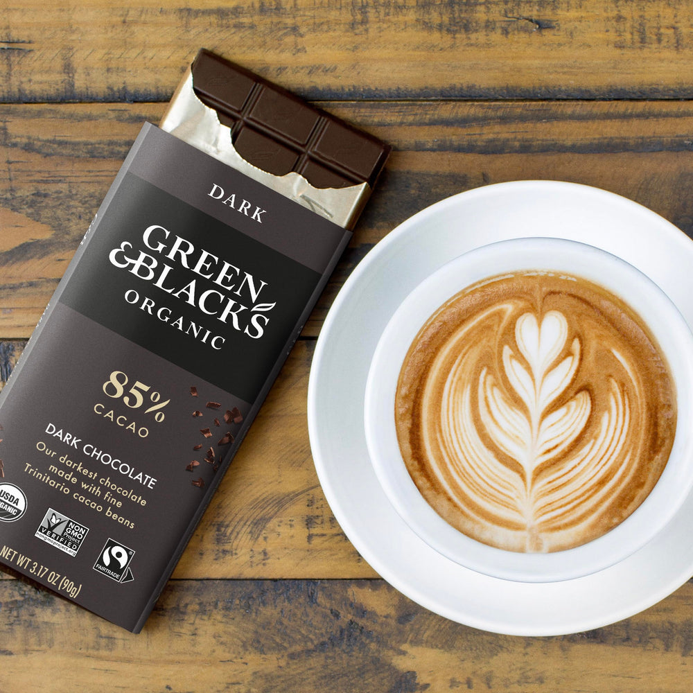 Green & Black's Organic fair trade logo signals ethical sourcing.