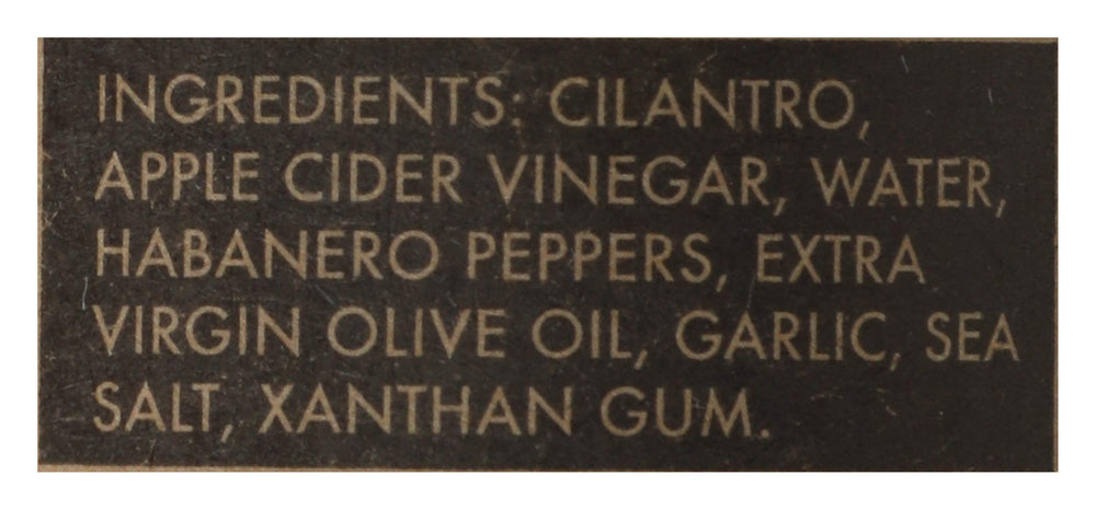 Closeup of cilantro and garlic in Green Belly Hot Sauce adds fresh flavor
