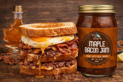 Close-up of maple bacon jam spread on toast, rich and glossy.
