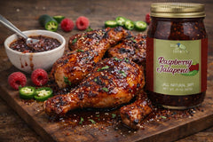 Green Jay Gourmet Raspberry Jalapeno Jam bottle closeup highlights natural ingredients.