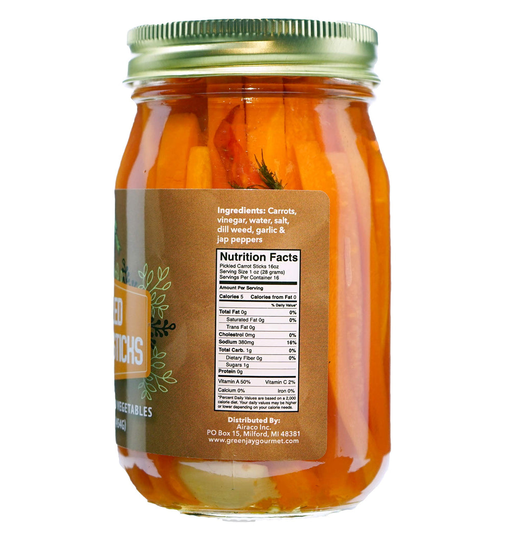 Green Jay Gourmet spicy pickled carrot sticks jar closeup brine shows bold flavor.
