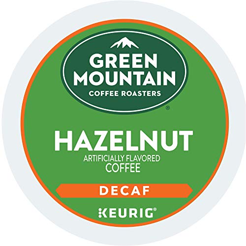Brand logo on a mug sleeve beside hazelnut aroma.