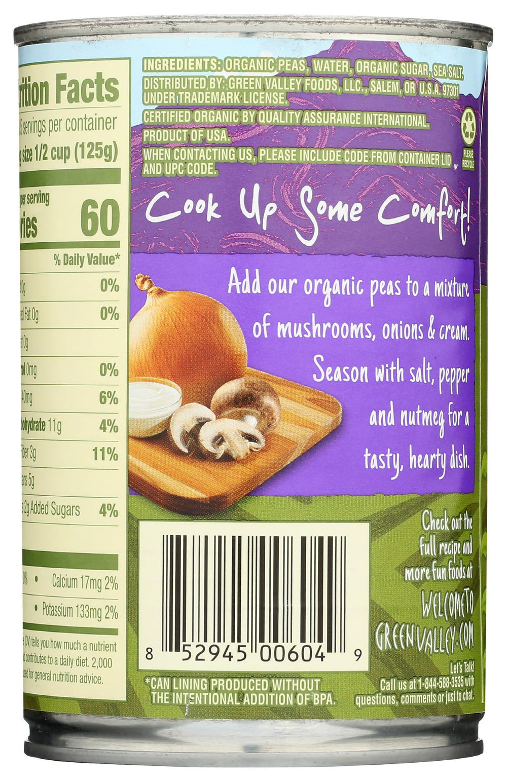 Green Valley Organic Sweet Peas in pantry can close-up, convenient pantry staple.