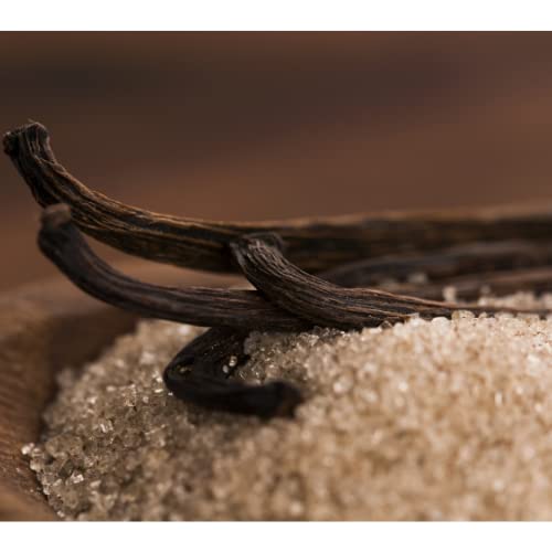 Green Vanilla beans used in a busy kitchen for baking and flavoring.