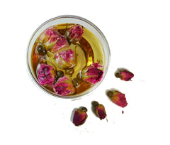 Greenhilltea Rose Buds arranged in a basket, perfect for preparing fresh infusions.