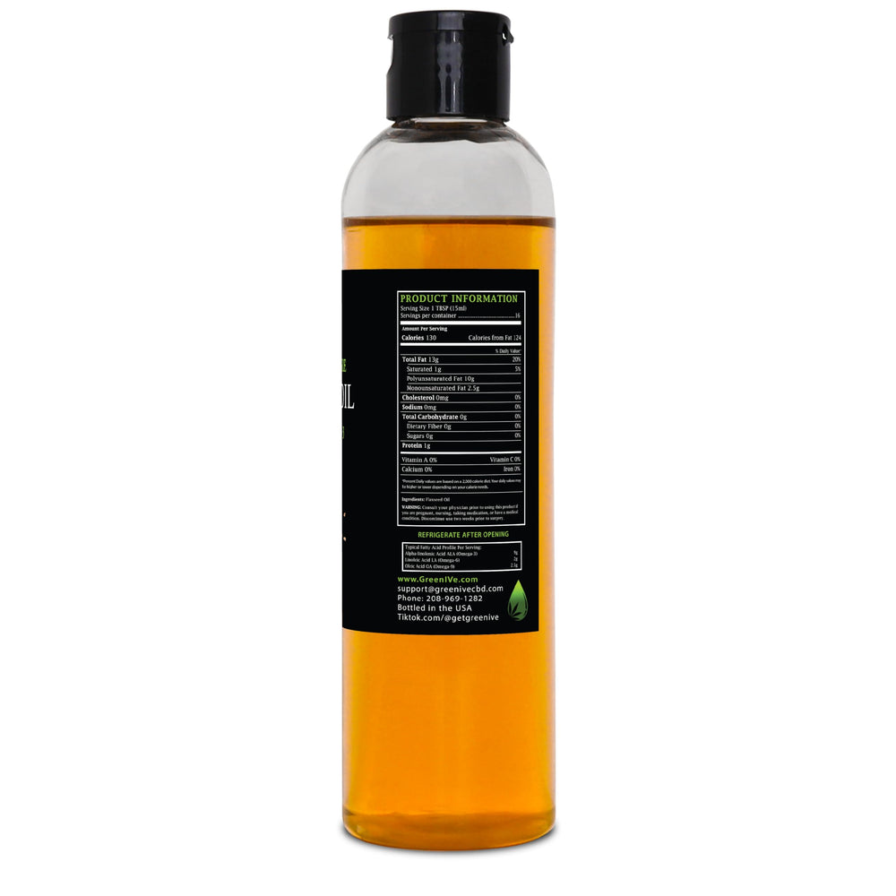 GreenIVe flax seed oil pour into spoon, easy drizzle for omega-rich meals.