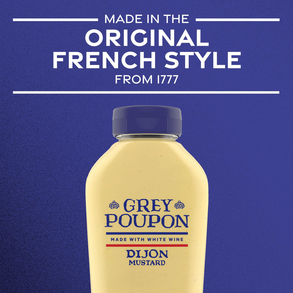 Grey Poupon Dijon dipping sauce with creamy texture.