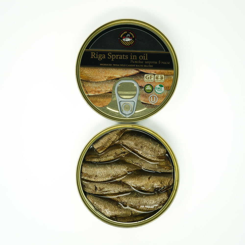 GRILLED CATCH Riga smoked sprats tin presents premium flavor for quick snacking.