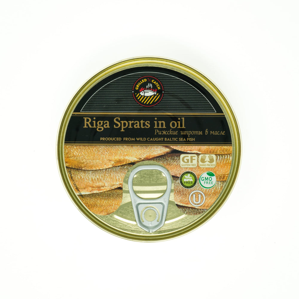 GRILLED CATCH sprats tin open in oil ready to elevate salads or bowls.