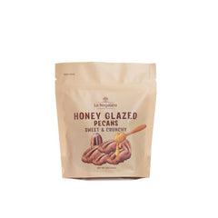 Grupo La Nogalera honey glazed pecans in a 5oz bag for on the go crunch.