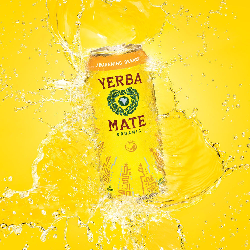 Ambient outdoor shot of Guayaki Yerba Madre Awakening Orange can for a refreshing break