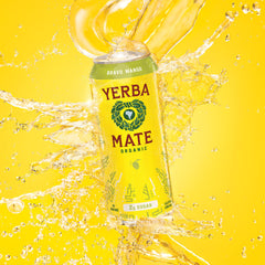Guayaki Yerba Madre Mango glass sip conveys refreshing mango mate energy.