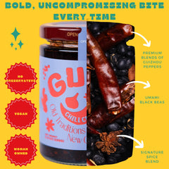 GUIZ chili crisp being poured over noodles for savory depth