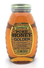 Gunter's Honey Golden jar with amber-gold honey, perfect for toast and tea.