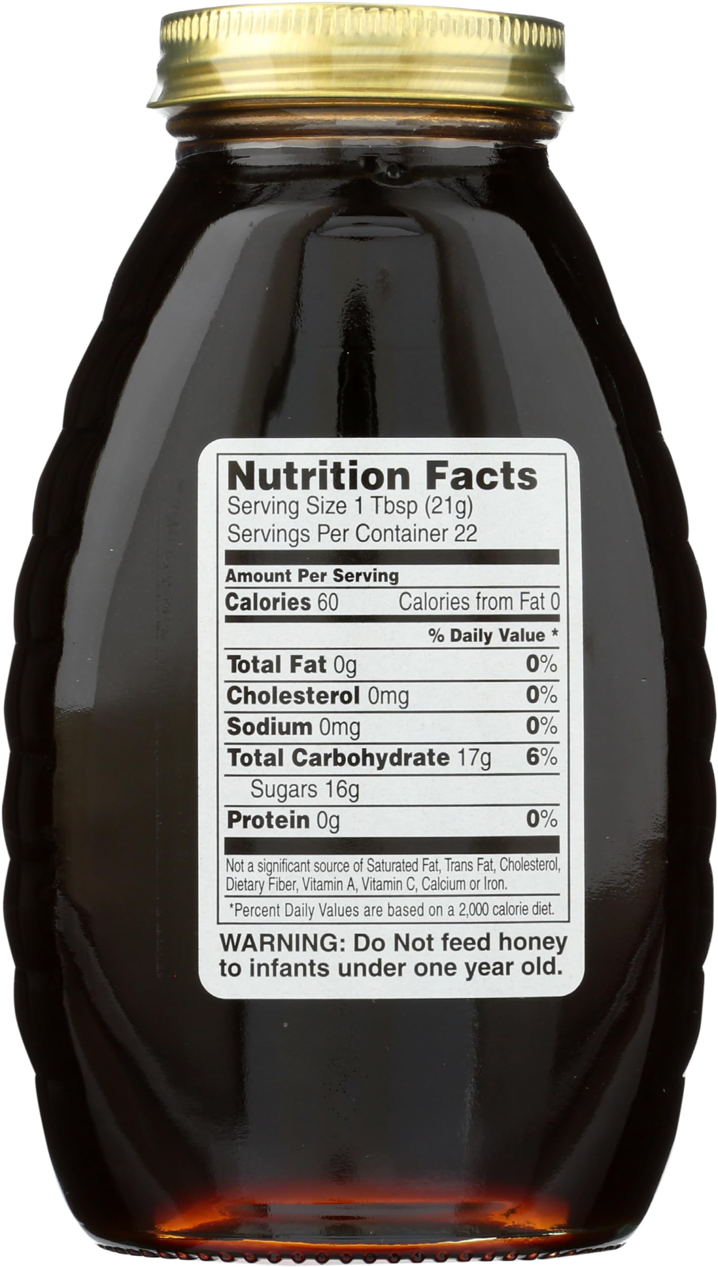 Close-up of Gunter's Buckwheat Honey label emphasizing natural U.S. Grade A quality.