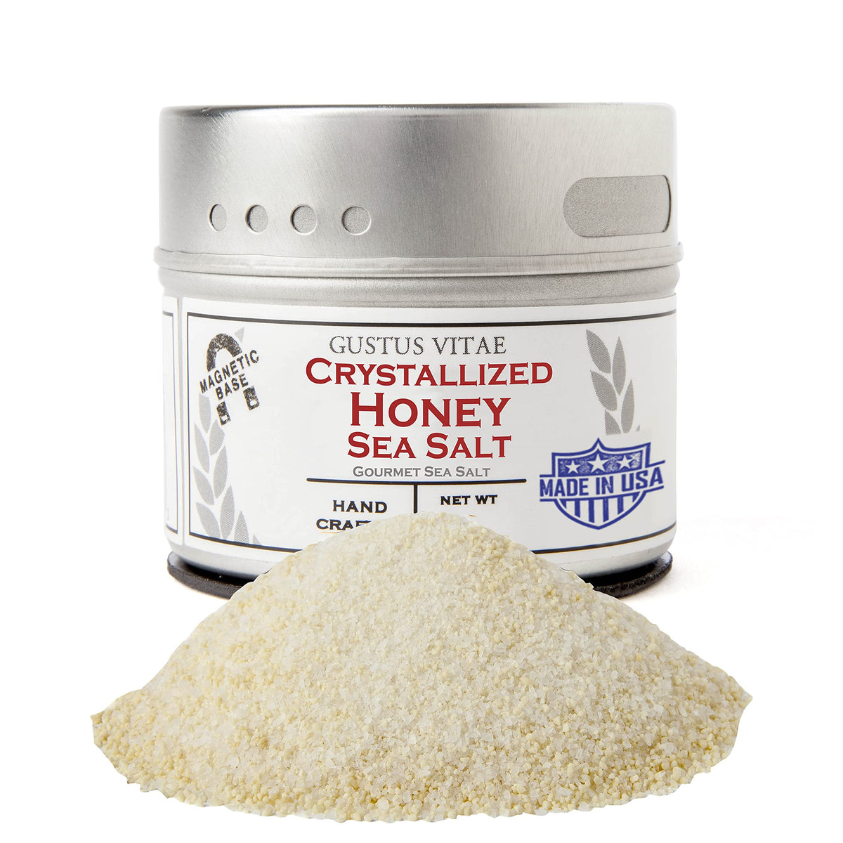 Gustus Vitae crystallized honey sea salt tin on countertop, ideal finishing touch for dishes.