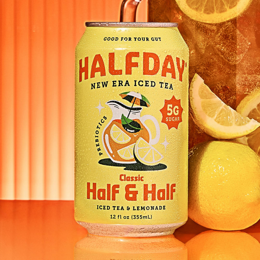 HALFDAY glass serve shows refreshing iced tea over ice for a balanced break