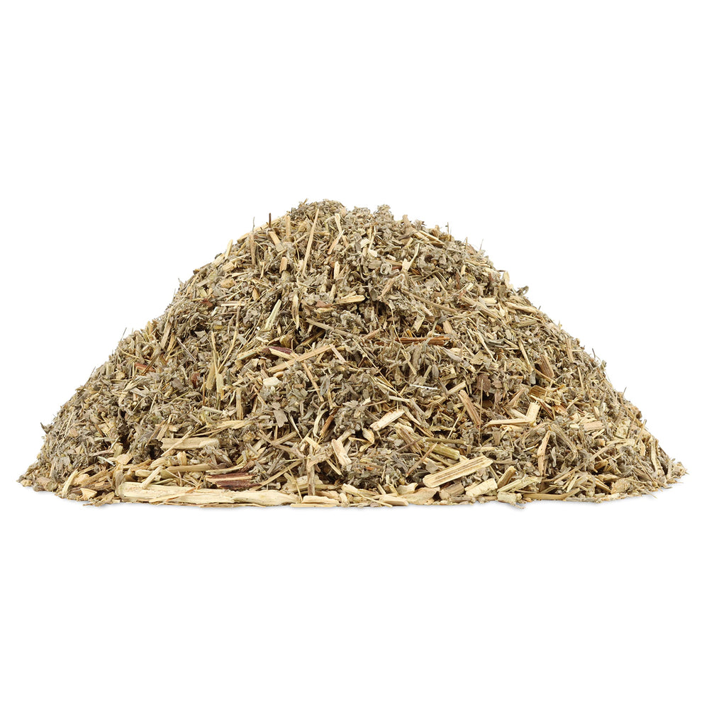 Halo Naturals wormwood tea brew in a cozy mug