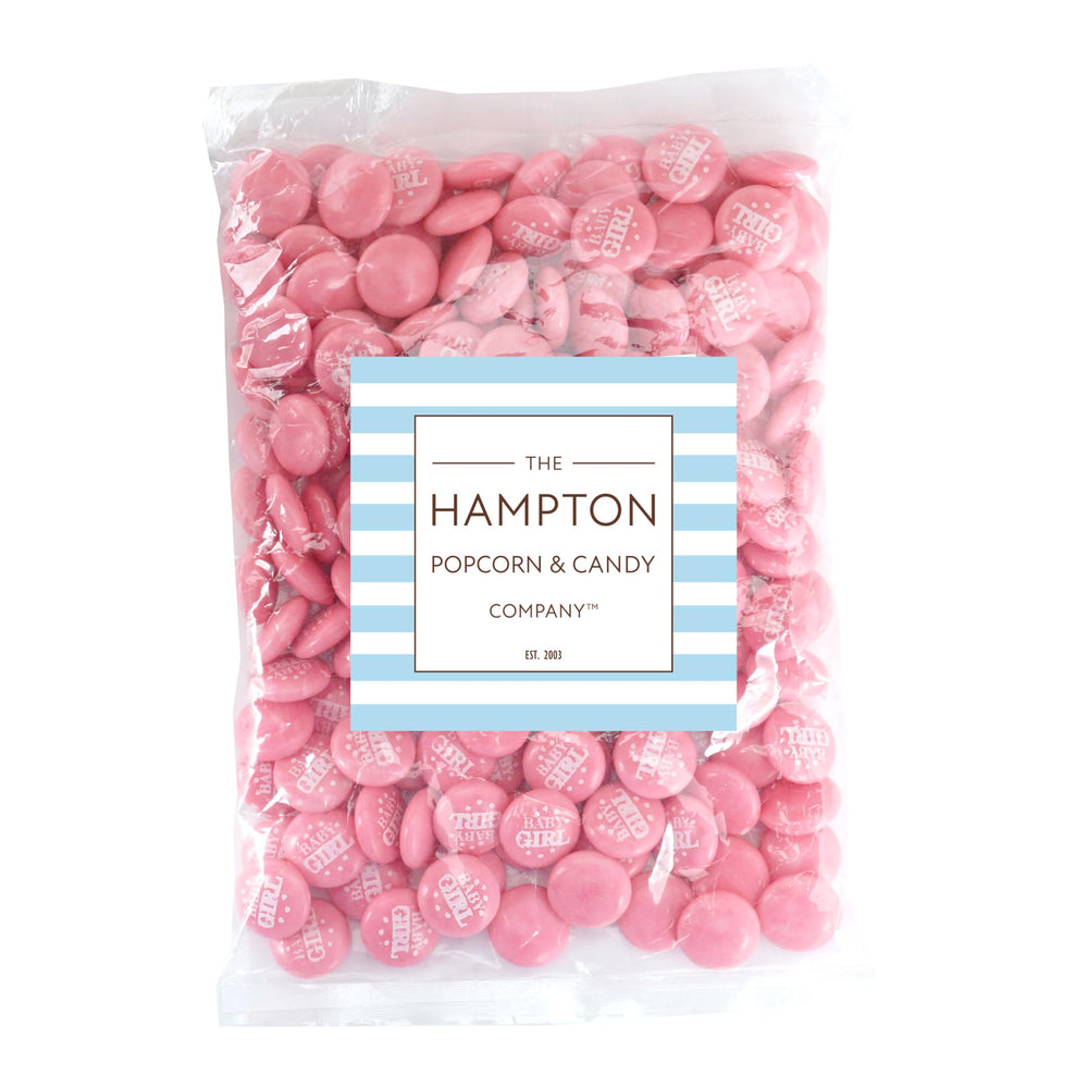 The Hampton Candy Company baby shower table display adds color to the candy station