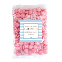 The Hampton Candy Company baby shower table display adds color to the candy station