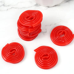 Wheels unrolling on a table, ideal for party treats.