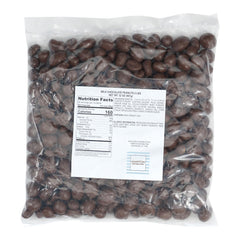 Close-up of The Hampton Candy Company milk chocolate-covered peanuts with a glossy shell for a delicious bite.