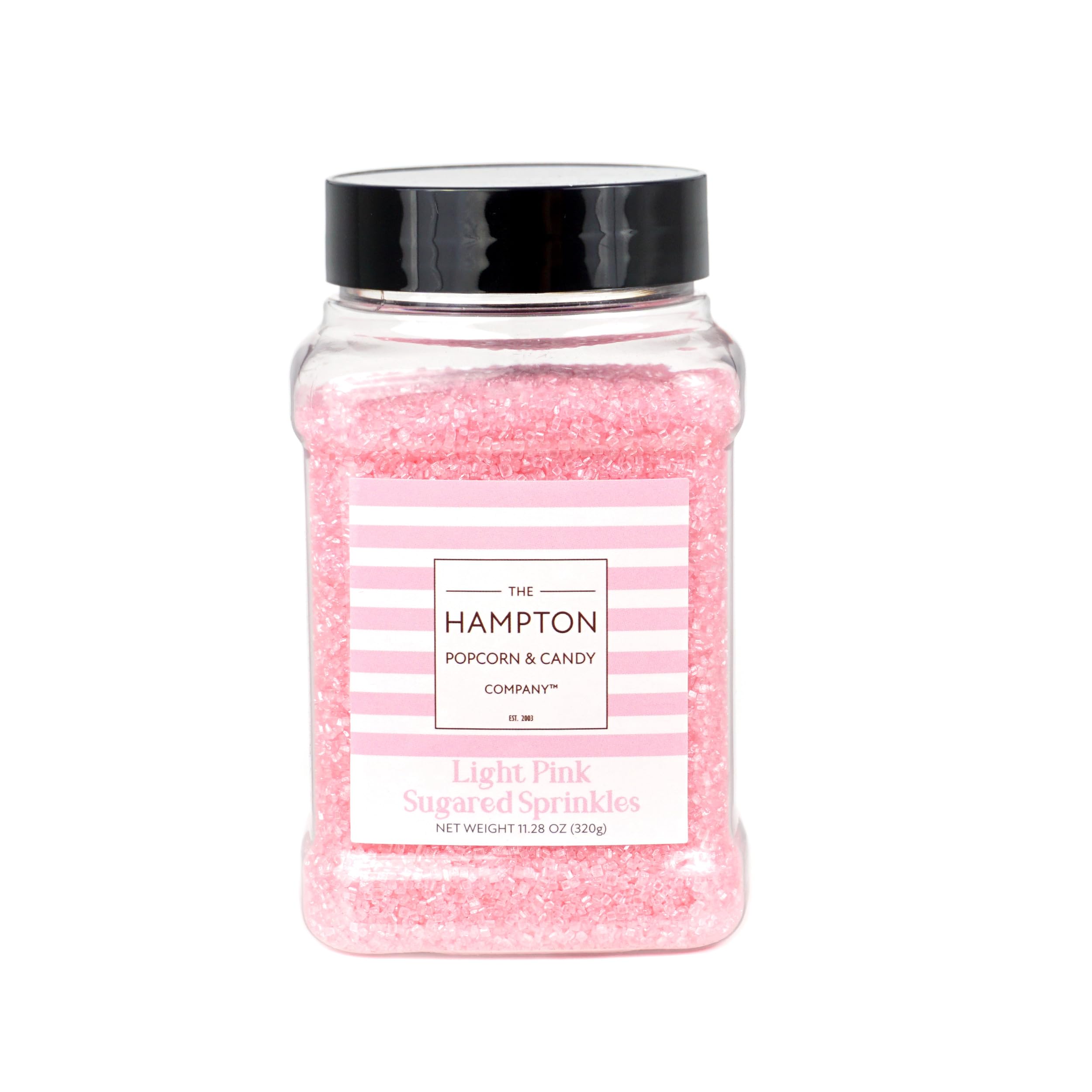 The Hampton Candy Company pink sanding sugar decorates cookies with whimsical, vibrant color.