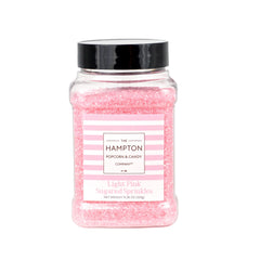 The Hampton Candy Company pink sanding sugar decorates cookies with whimsical, vibrant color.