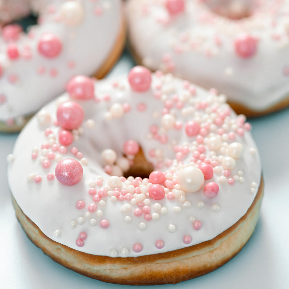 The Hampton Edible Pearls cupcake topping adding visual appeal.