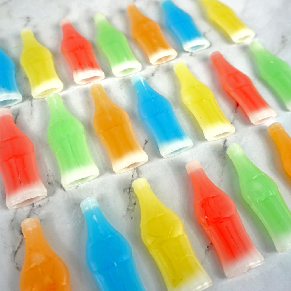 Nik-L-Nips wax bottle candy with juicy liquid center delivers a fruity surprise.