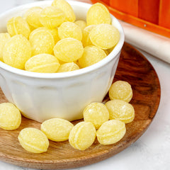 Candies arranged on a party platter showcase tangy-sweet lemon goodness