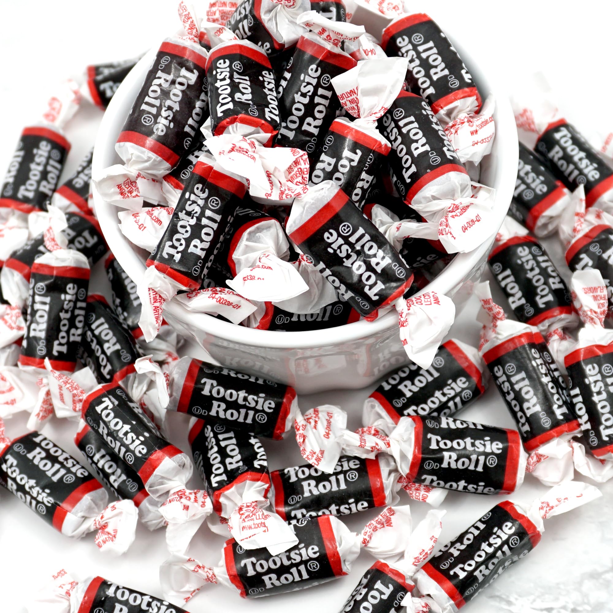 Tootsie Roll Midgees mini bites close-up—individually wrapped chewy chocolate candies.