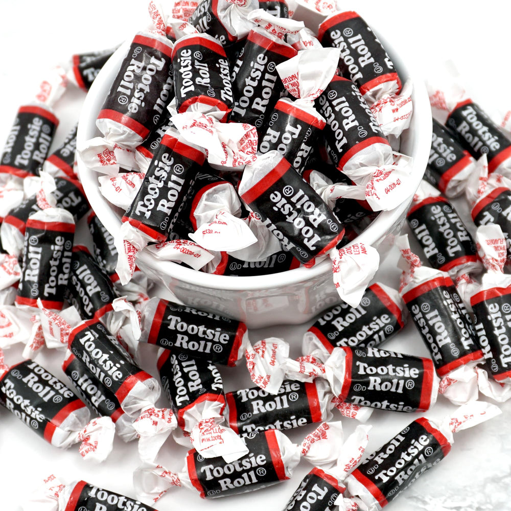 Tootsie Roll Midgees mini bites close-up—individually wrapped chewy chocolate candies.