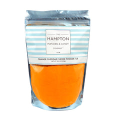 The Hampton Popcorn Company cheddar cheese powder jar boosts popcorn flavor