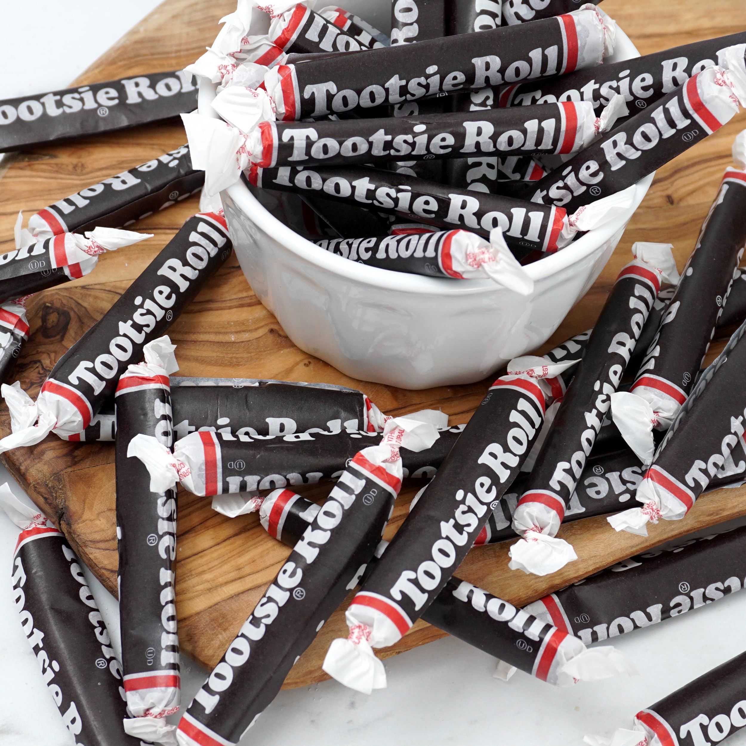 Individually wrapped Tootsie Rolls for quick party snacks.