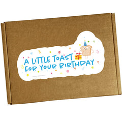 Hangry Kit Birthday Box open showing a varied snack mix for sharing