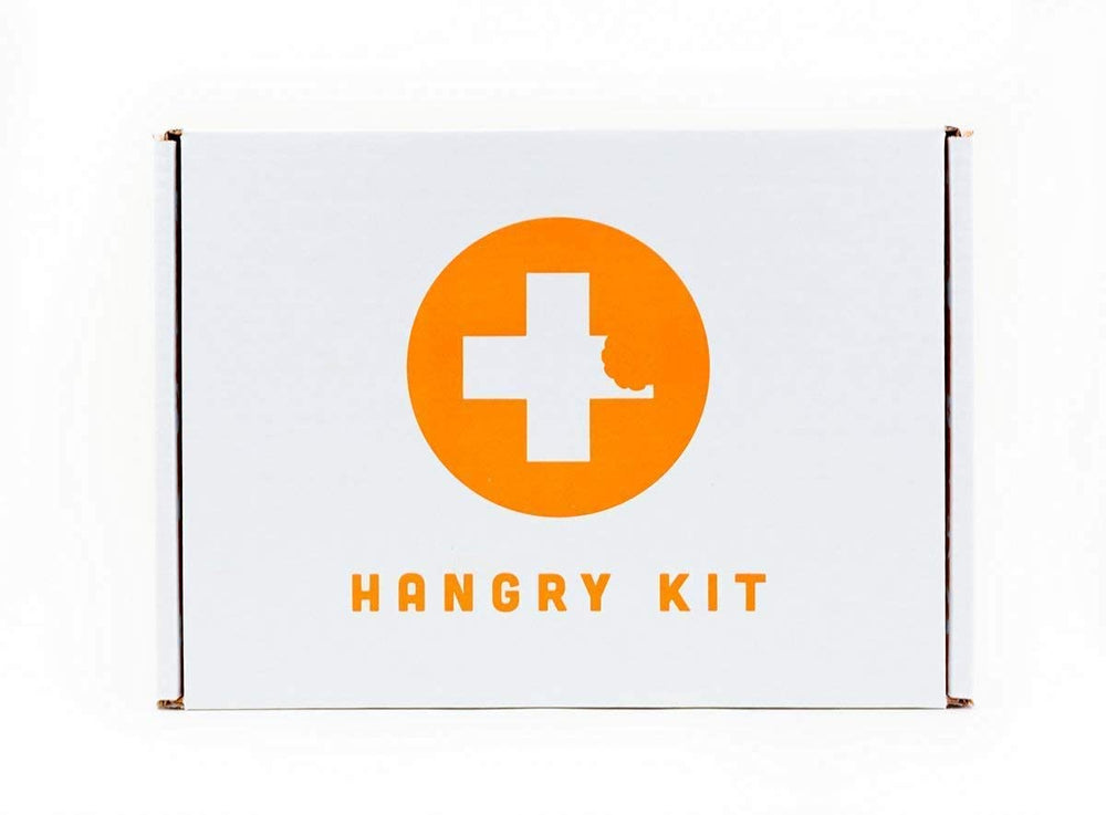 Hangry Kit Mega Care Pack snacks layout showcases twenty diverse treats for on-the-go snacking.