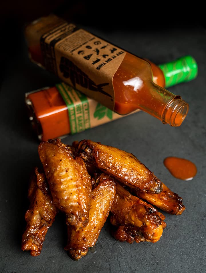 Hank Sauce Herb Infused Hot Sauce bottle used in marinades and dips.