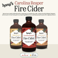 Glass bottle showing raw ingredients in Hany's Harvest Fire Cider for natural goodness