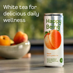 Label close-up of Happy Being Peach Sparkling White Tea highlighting natural ingredients.