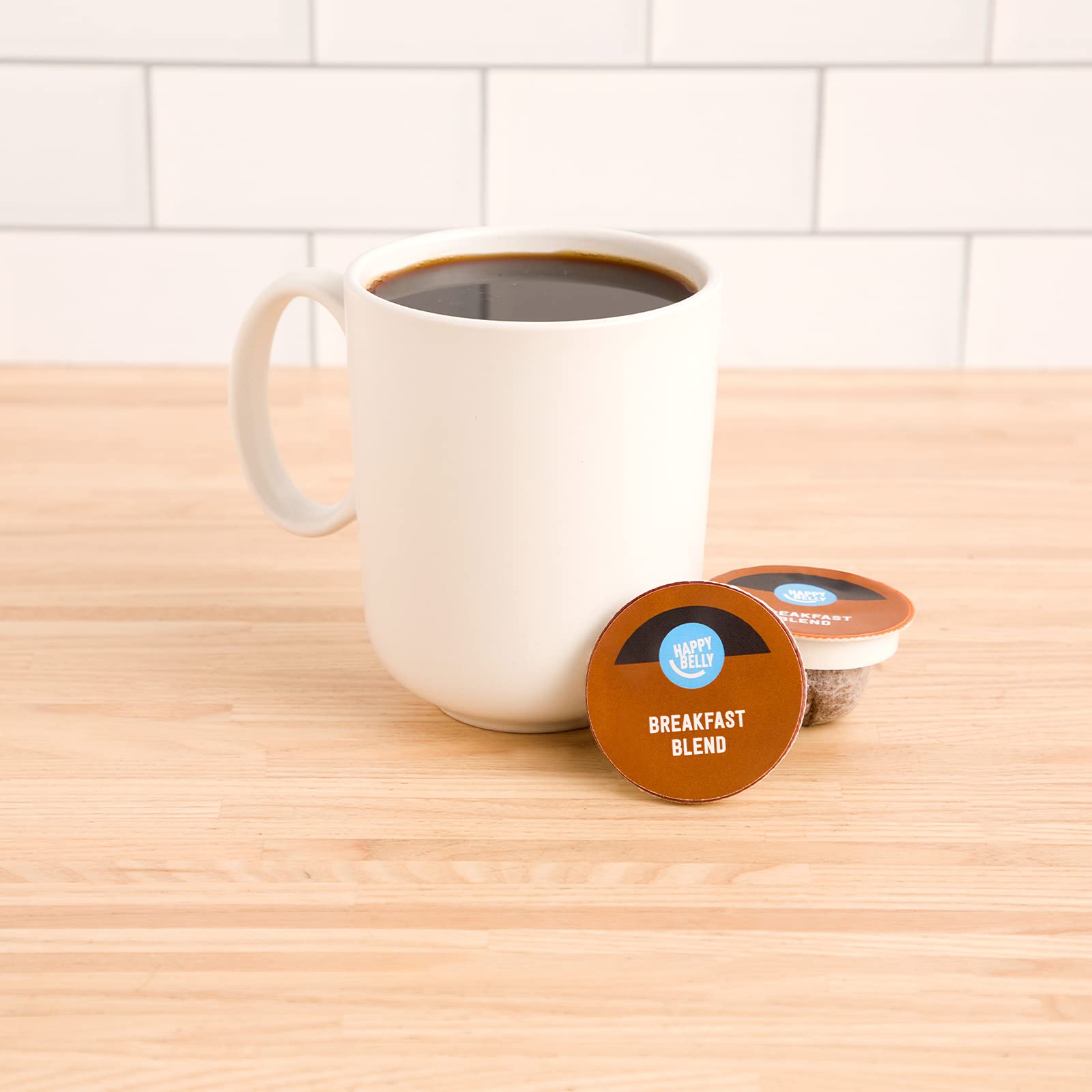Happy Belly Breakfast Blend pods lined up for organized viewing on the shelf