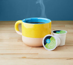 Happy Belly Decaf Breakfast Blend pod packaging, a convenient pack for quick breakfast brews.